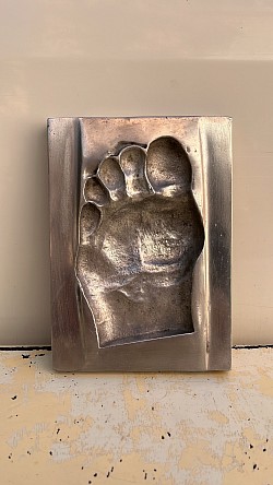 Sculpture pied fonte d aluminium